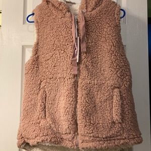 Woman’s large fuzzy vest